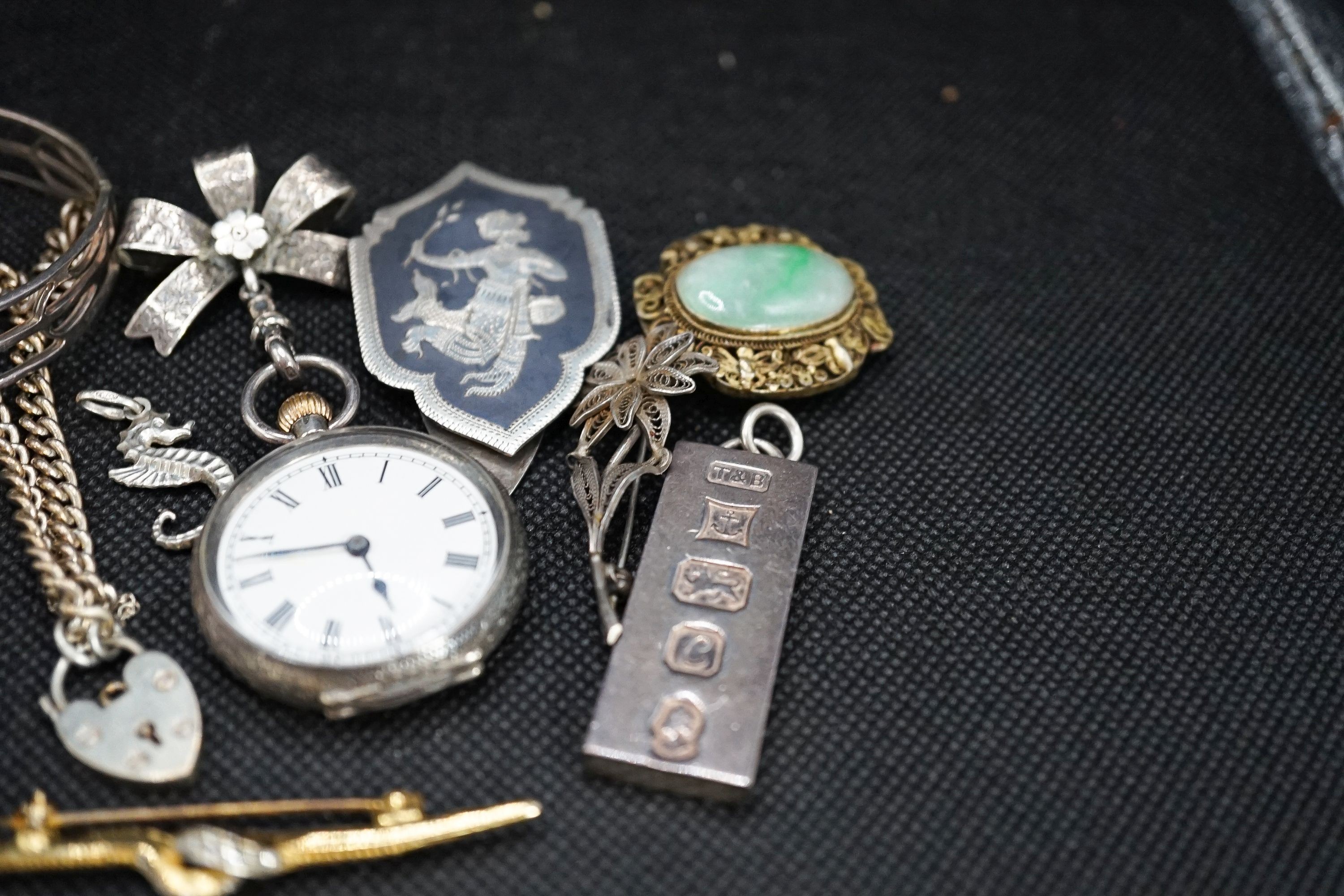 A silver fob watch, a late Victorian silver oval locket and other items of minor jewellery.